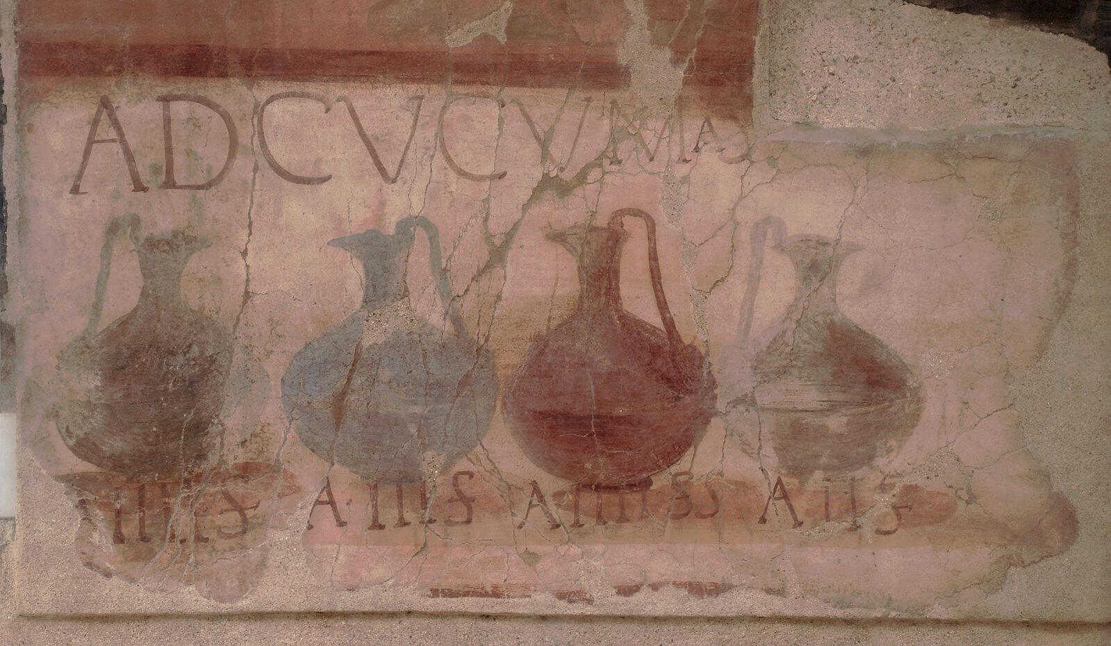 Sign advertising wines for sale at a popina in Herculaneum, in Italy.